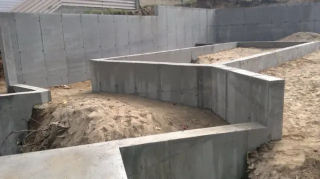 Monolitinis juostinis pamatas su rūsiu